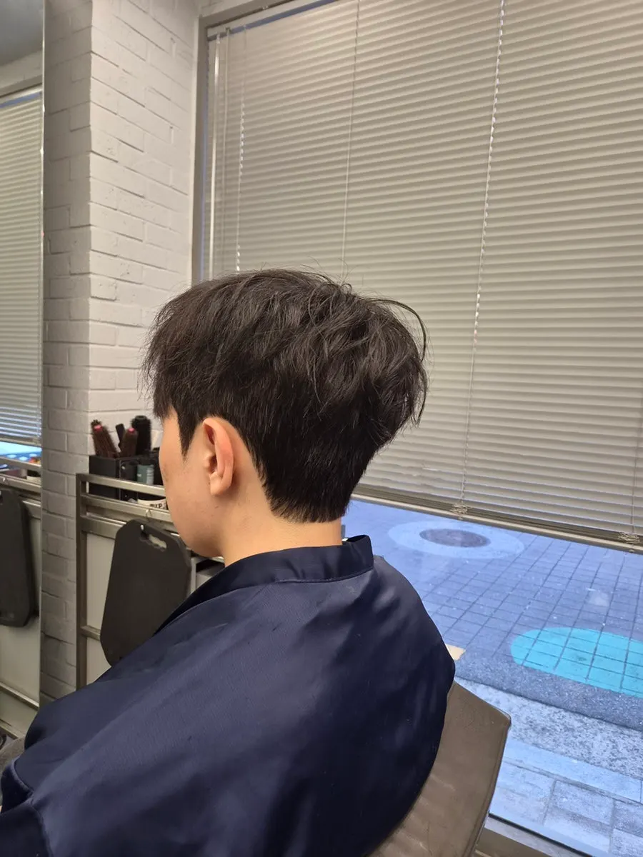 Finished men's hair after cut, down perm, and point perm