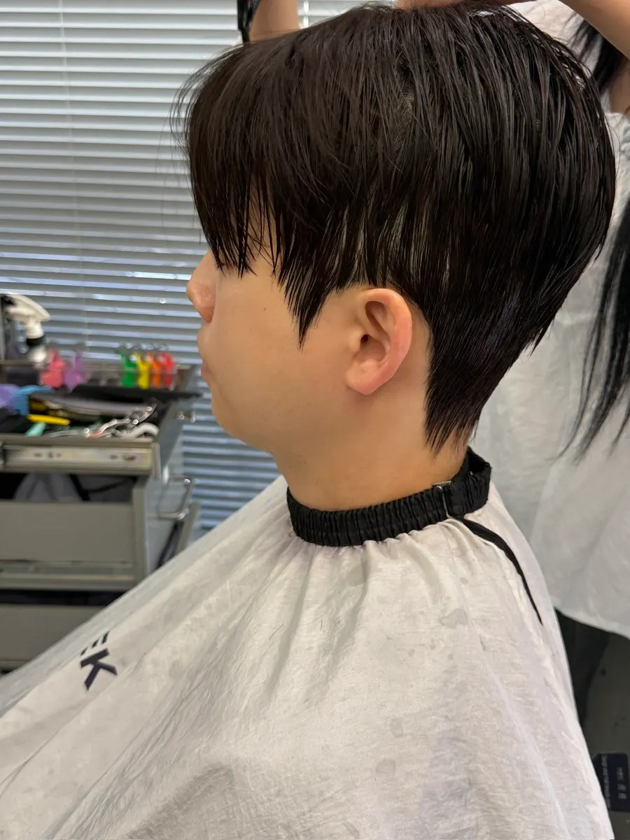 Man's hair calmed down after the down perm