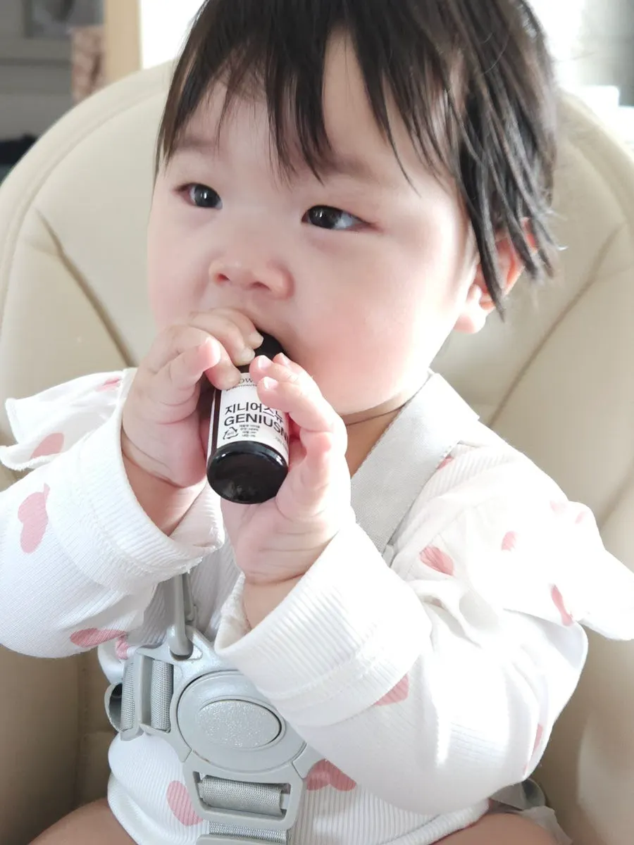 Baby taking Genius New