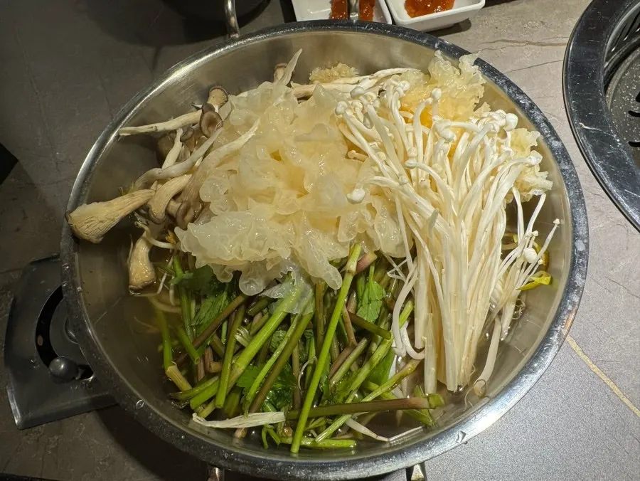 Plate of wrap vegetables and side dishes from the salad bar