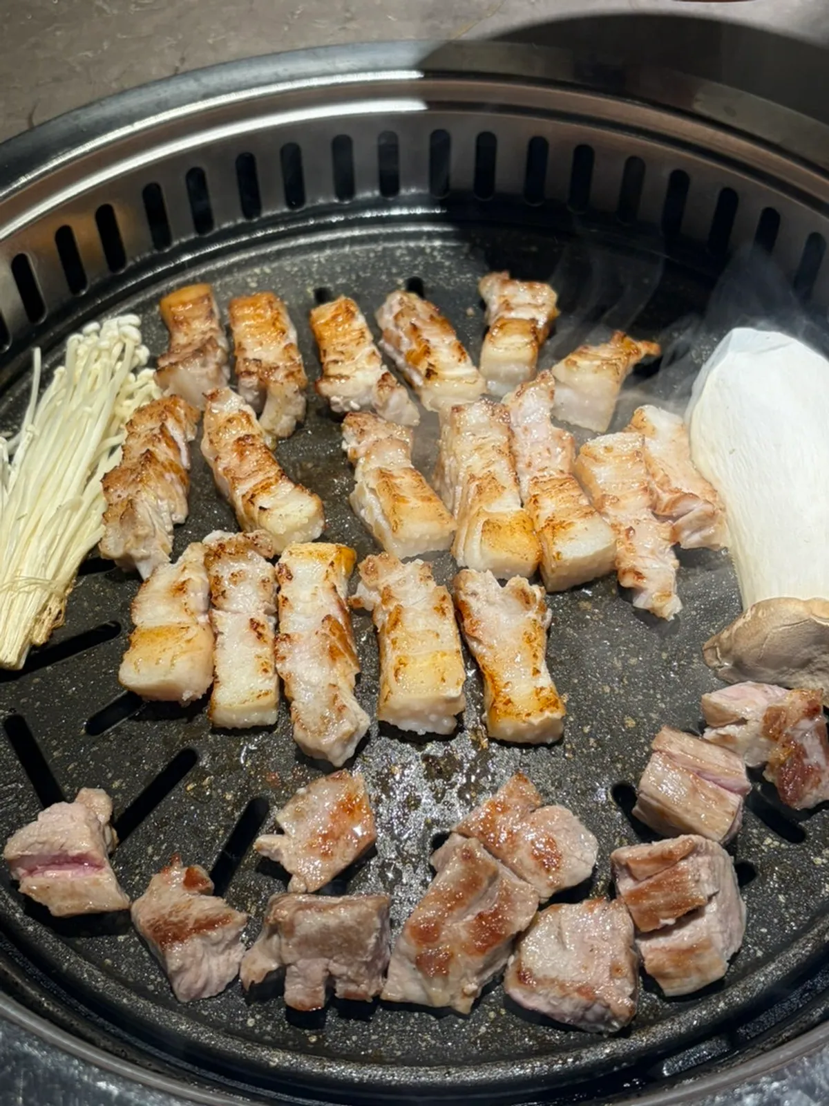 Golden-brown grilled pork belly and pork neck