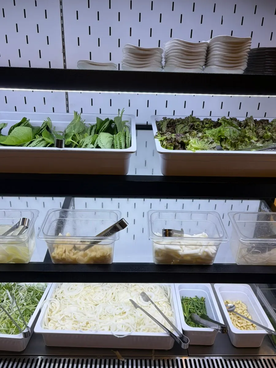 Sauce corner set up at the self-serve bar