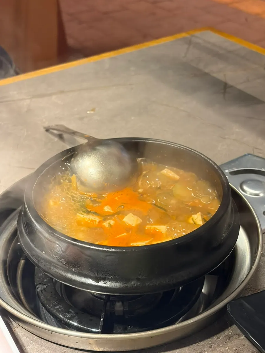 A bowl of bubbling doenjang-jjigae