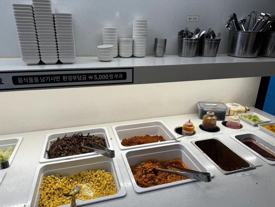 Self-serve banchan corner with wrap vegetables