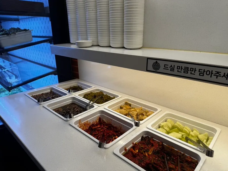 Self-serve corner stocked with side dishes