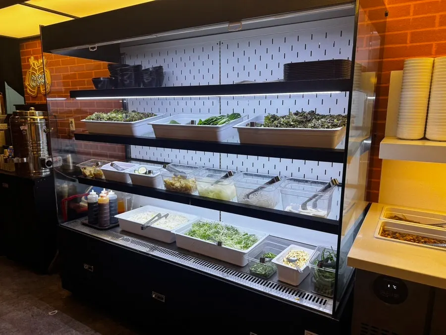 Plate of side dishes brought from the self-serve corner