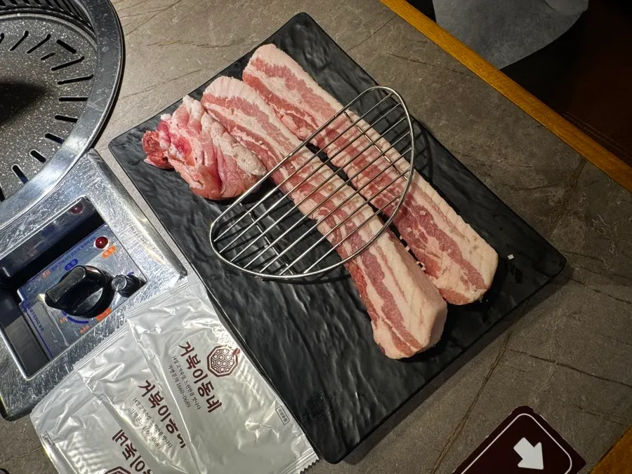 Plate of 5 servings of raw aged pork belly