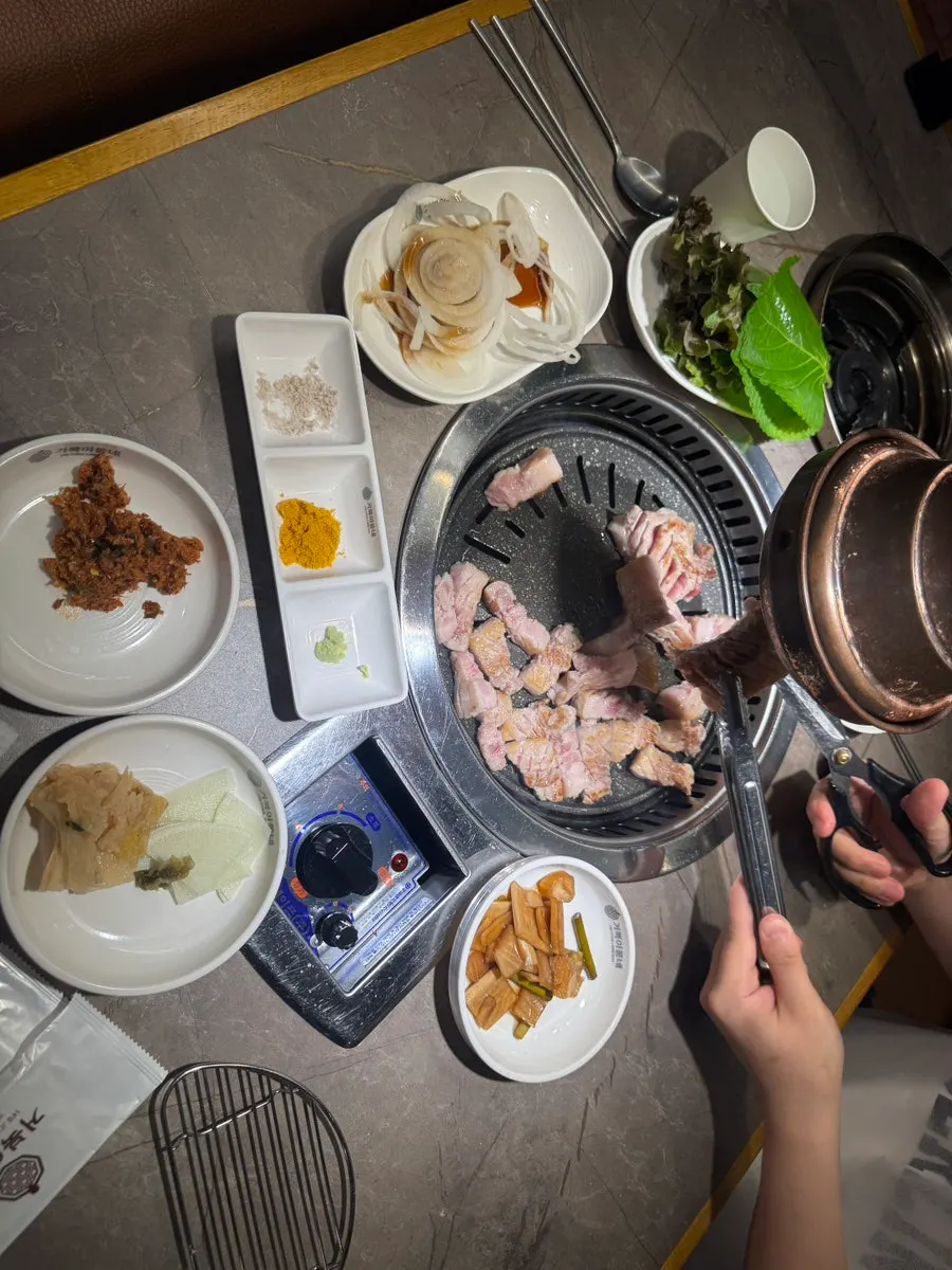 Pork belly grilling on the tabletop grill