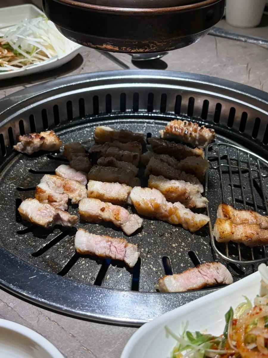 A drink enjoyed alongside the pork belly