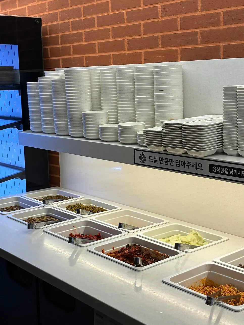 A plate of side dishes gathered from the self-serve bar