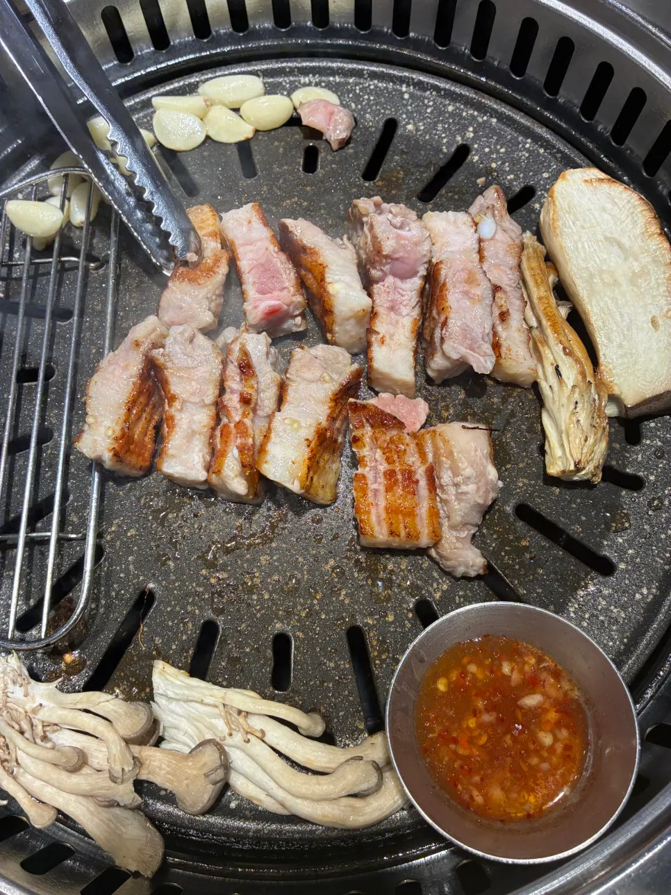 Pork belly and assorted mushrooms grilling