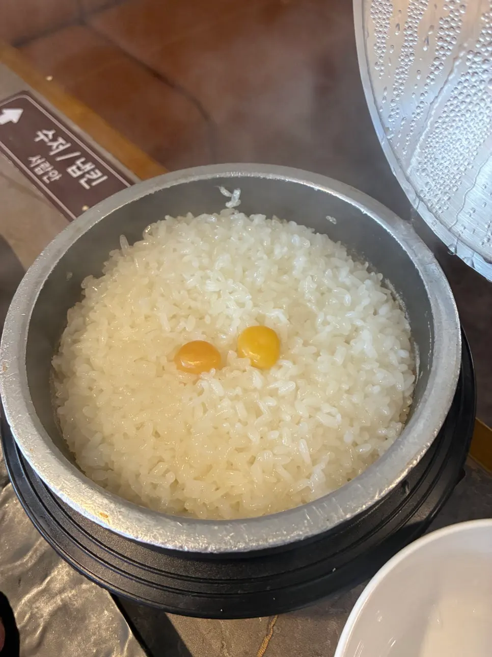 Freshly made pot rice with a glossy sheen
