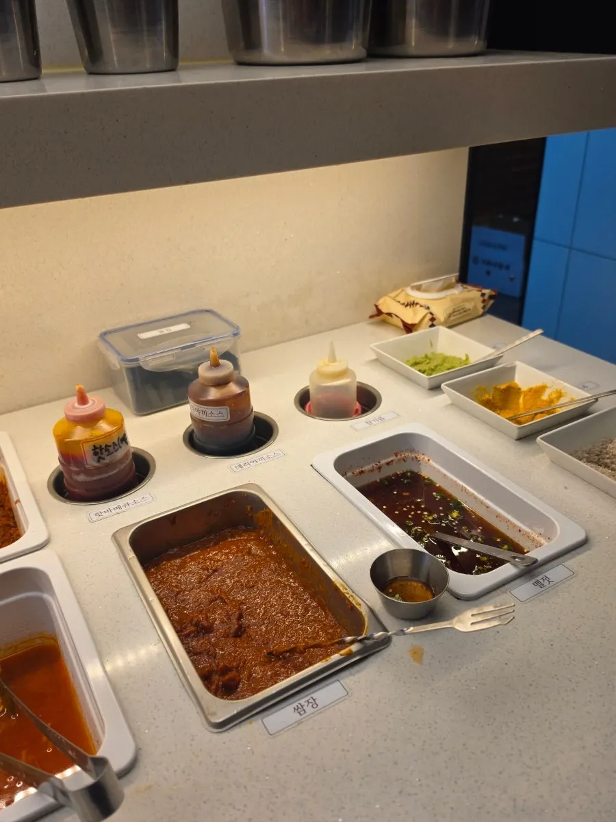 Vegetables and ham for banchan at the self-serve bar