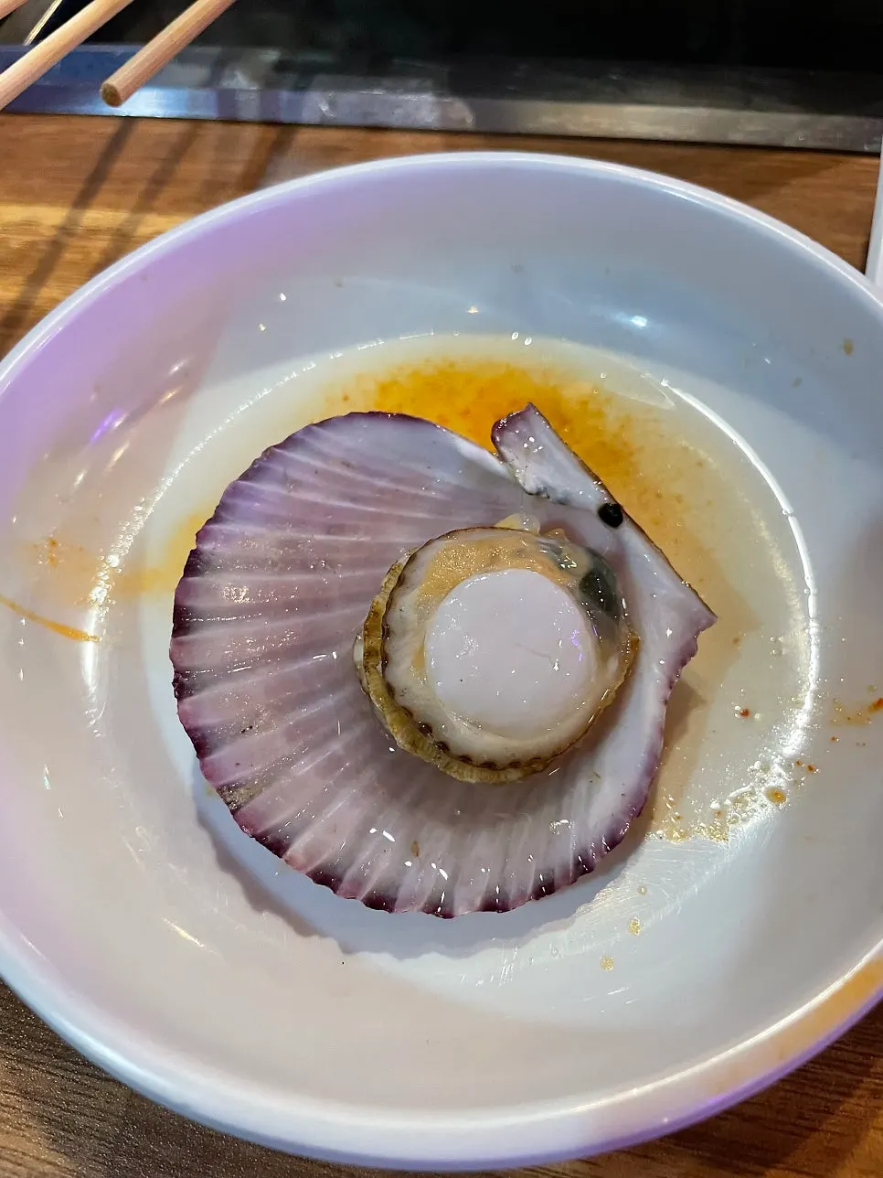 Pot full of scallops and hard clams