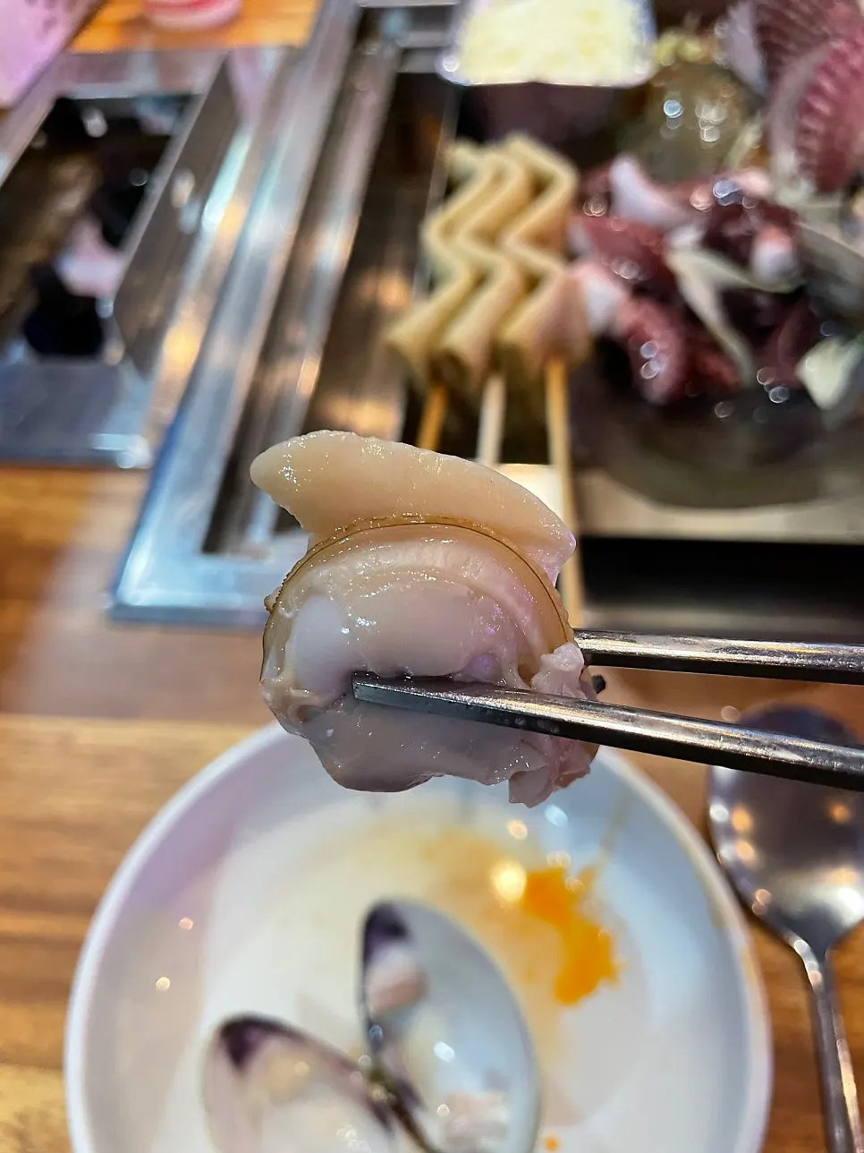 Mussels and other seafood inside the steamed clam pot
