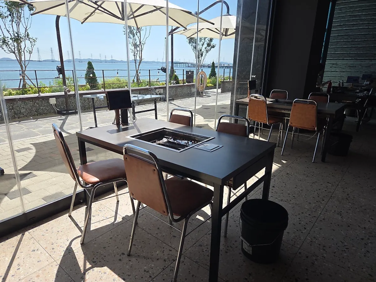 Terrace dining seats with a sea view