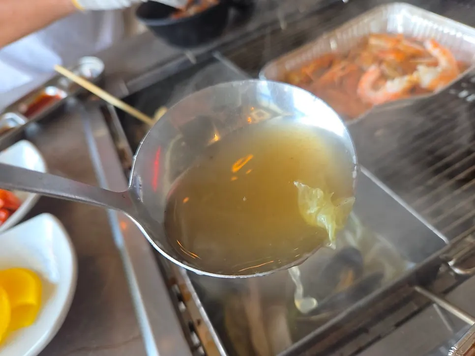 Clear seafood kalguksu broth