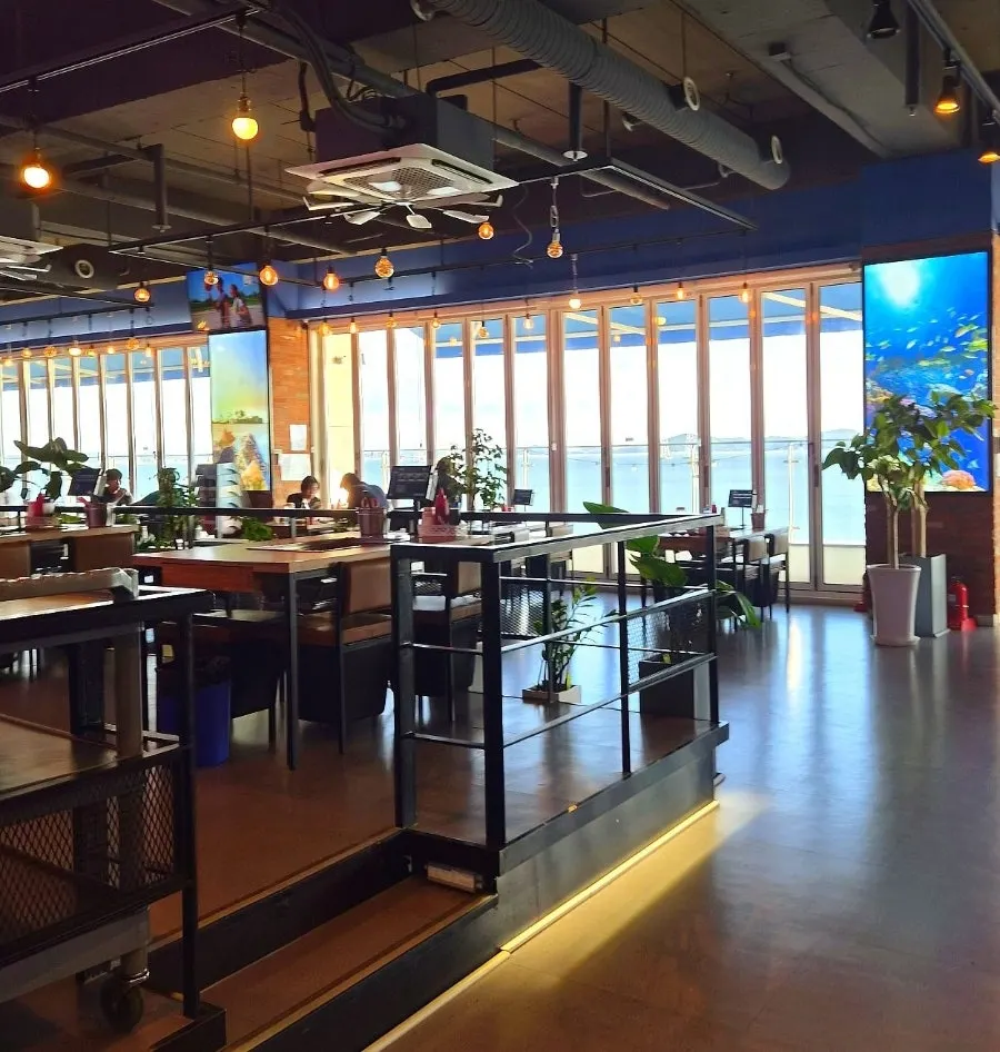 Dining area with sea views from the windows