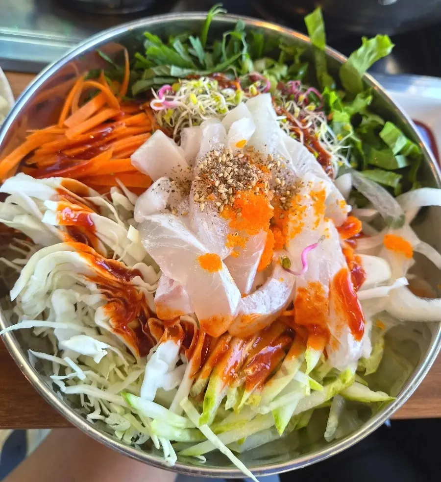 Seafood kalguksu and icy mulhoe spread