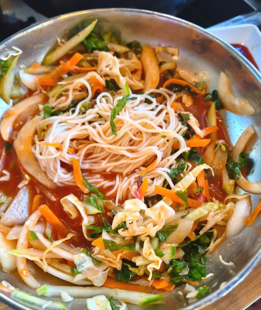 Sweet-and-tangy mulhoe served with thin noodles