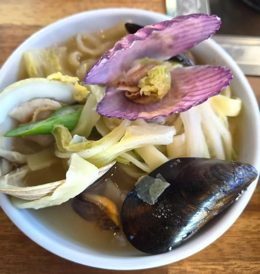 Kalguksu loaded with clams and seafood