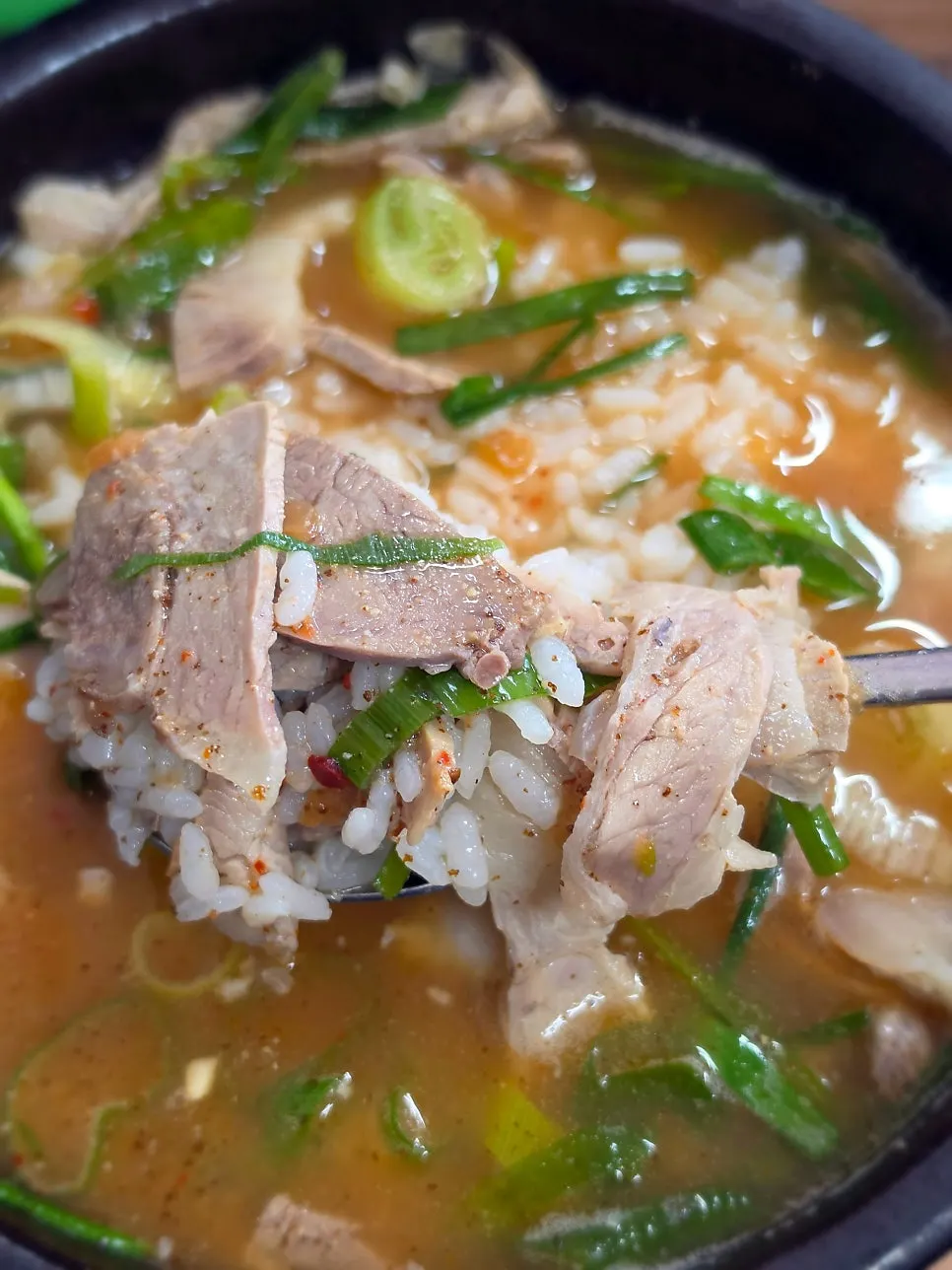 Rice mixed into pork gukbap