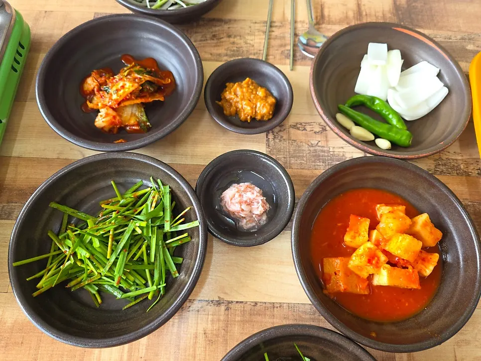 Side dish spread at Bongga Gukbap