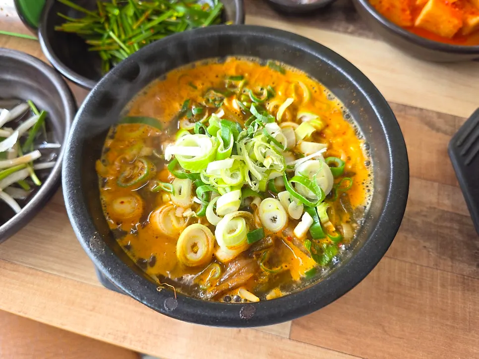 Table spread of gukbap and suyuk at Bongga Gukbap