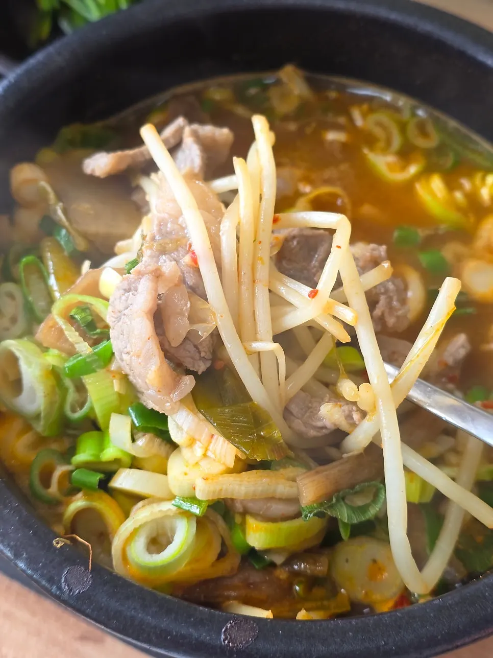 Bongga beef gukbap loaded with beef and bean sprouts