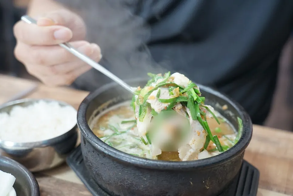 Pork gukbap broth with generous meat