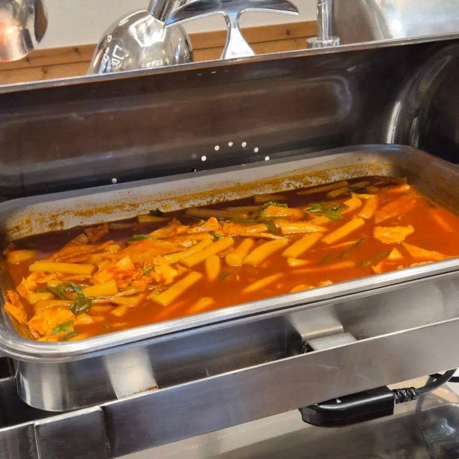 Pancake dishes and banchan prepared at the self-serve bar