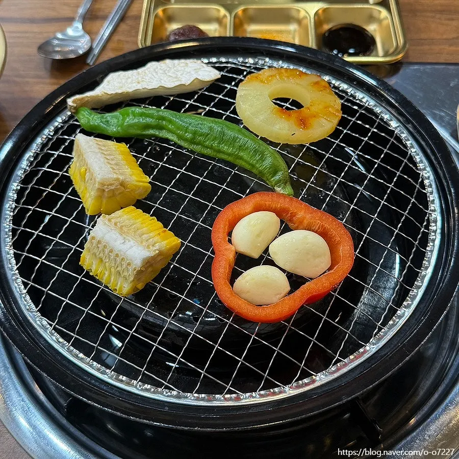 A plate of fully cooked grilled pork ribs