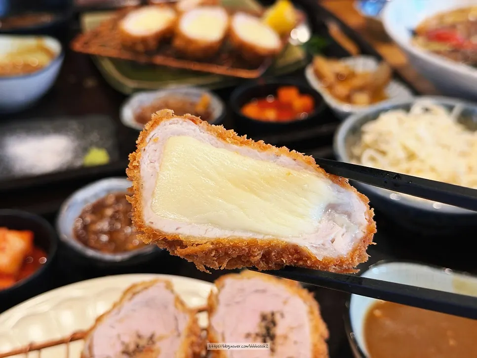 Cross-section of cheese pork cutlet with melted cheese stretching