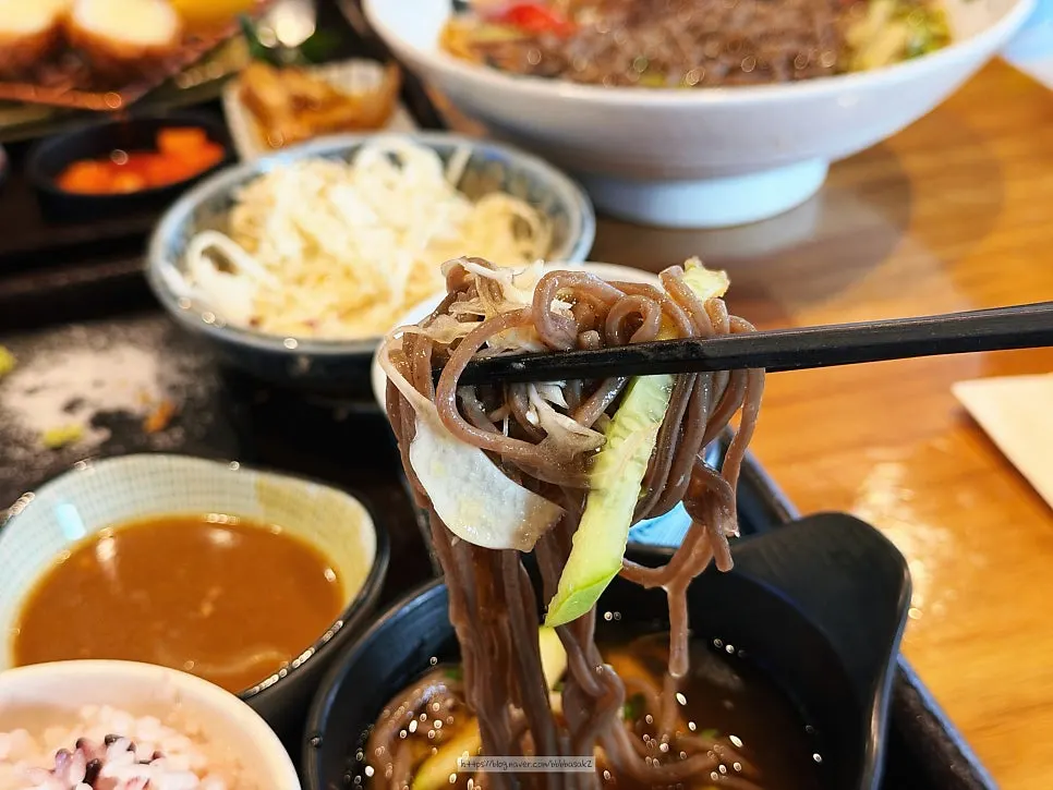 Buckwheat noodles dipped into the cold broth