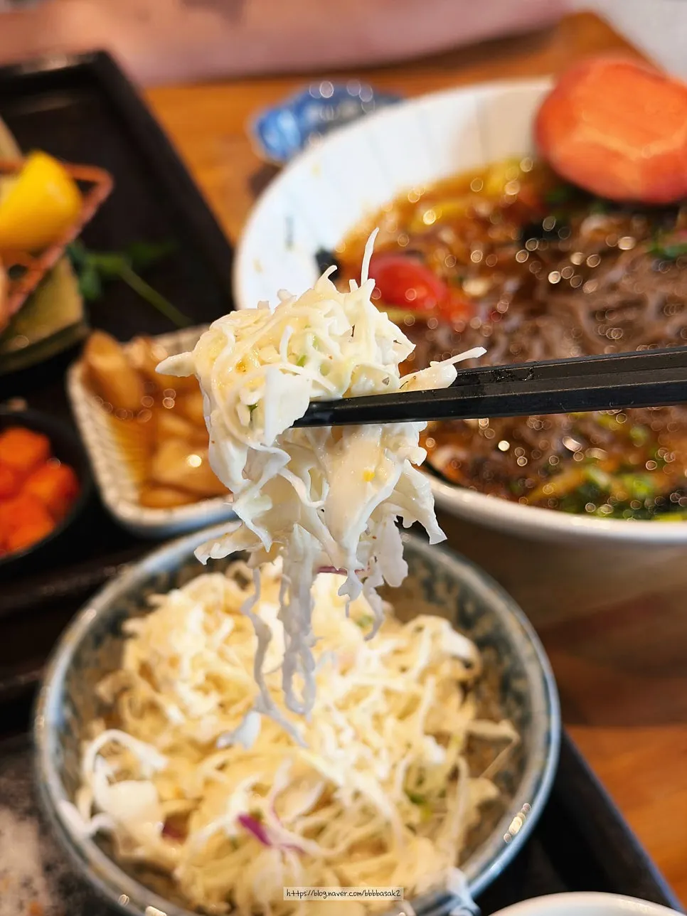 Table spread with cold buckwheat noodles and pork cutlet together