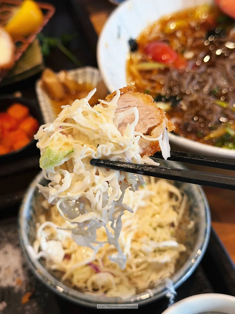 Vertical shot of pork cutlet and cold buckwheat noodles
