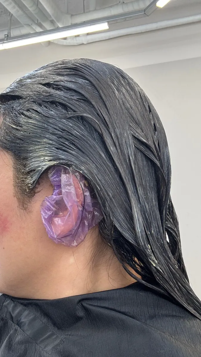 Hair resting while the dye processes