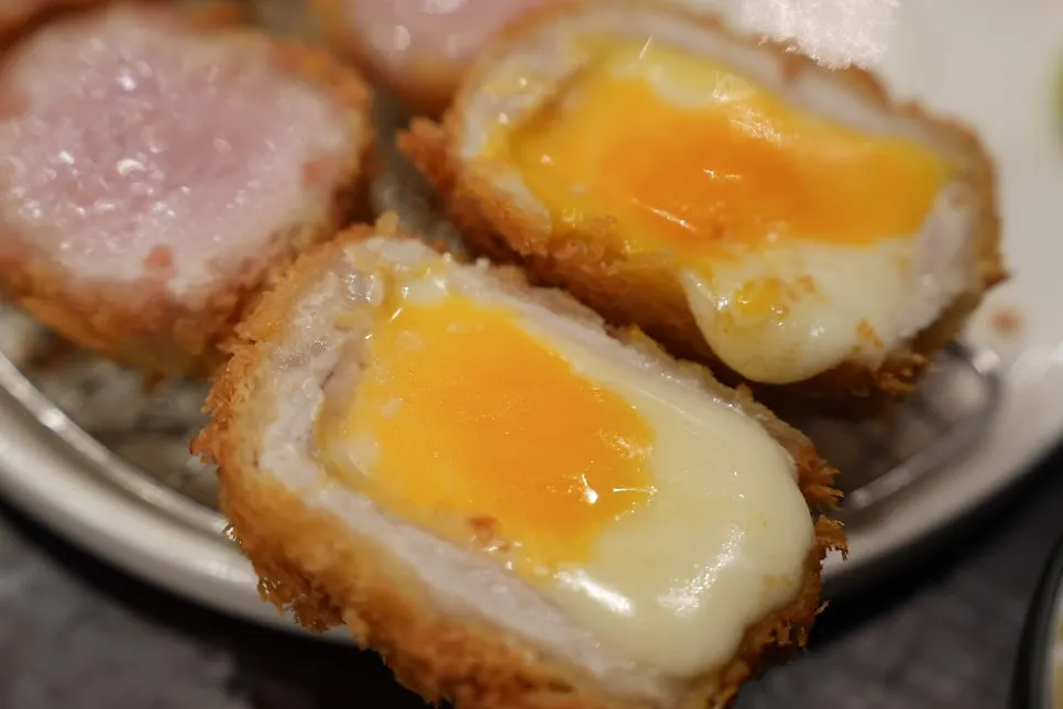 Cheese stretching from HOKATSU's cheese katsu