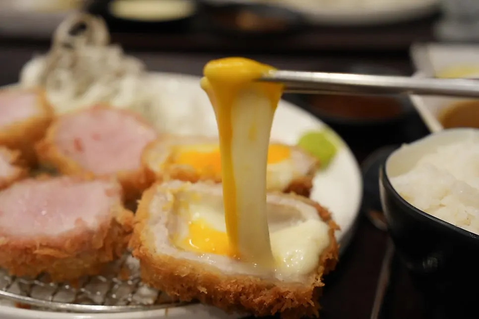 Cross-section of cheese katsu made with natural cheese