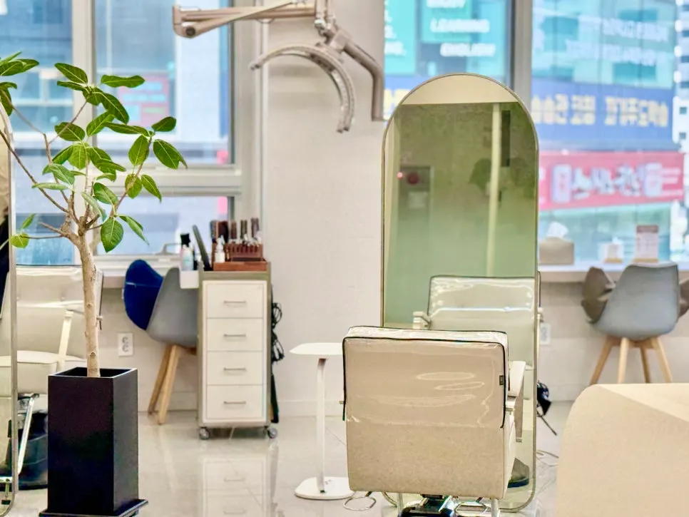 Hair salon interior with spacious treatment stations