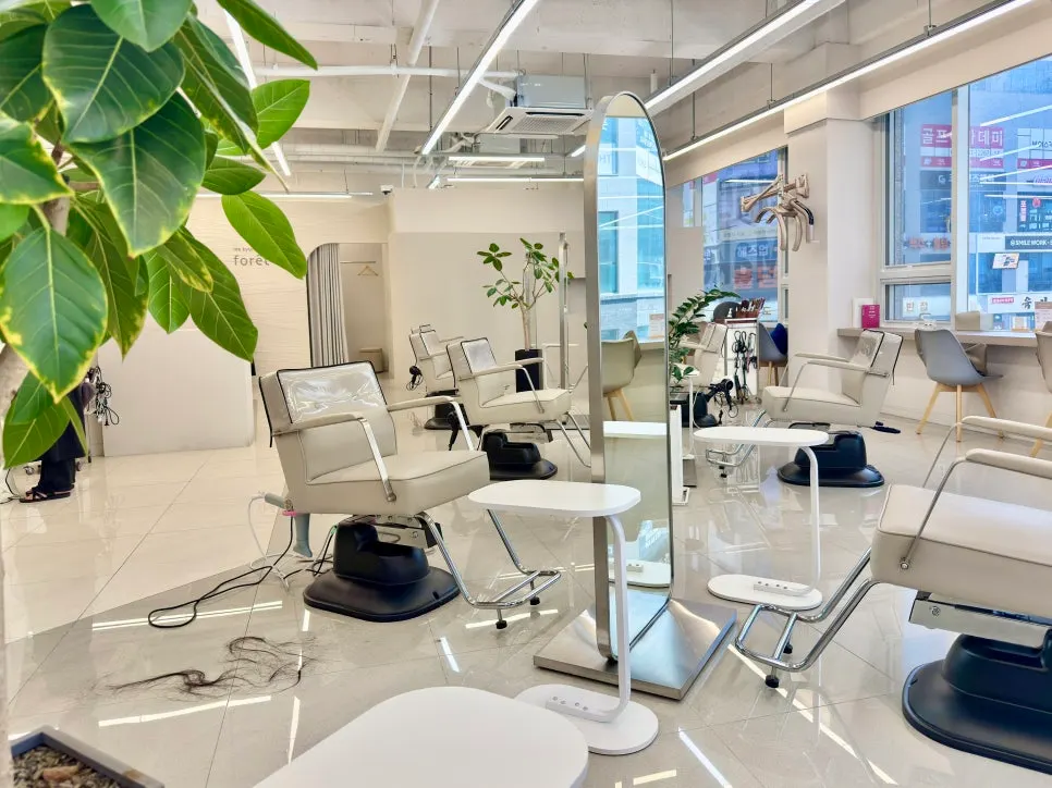 Hair salon treatment stations arranged with space between them