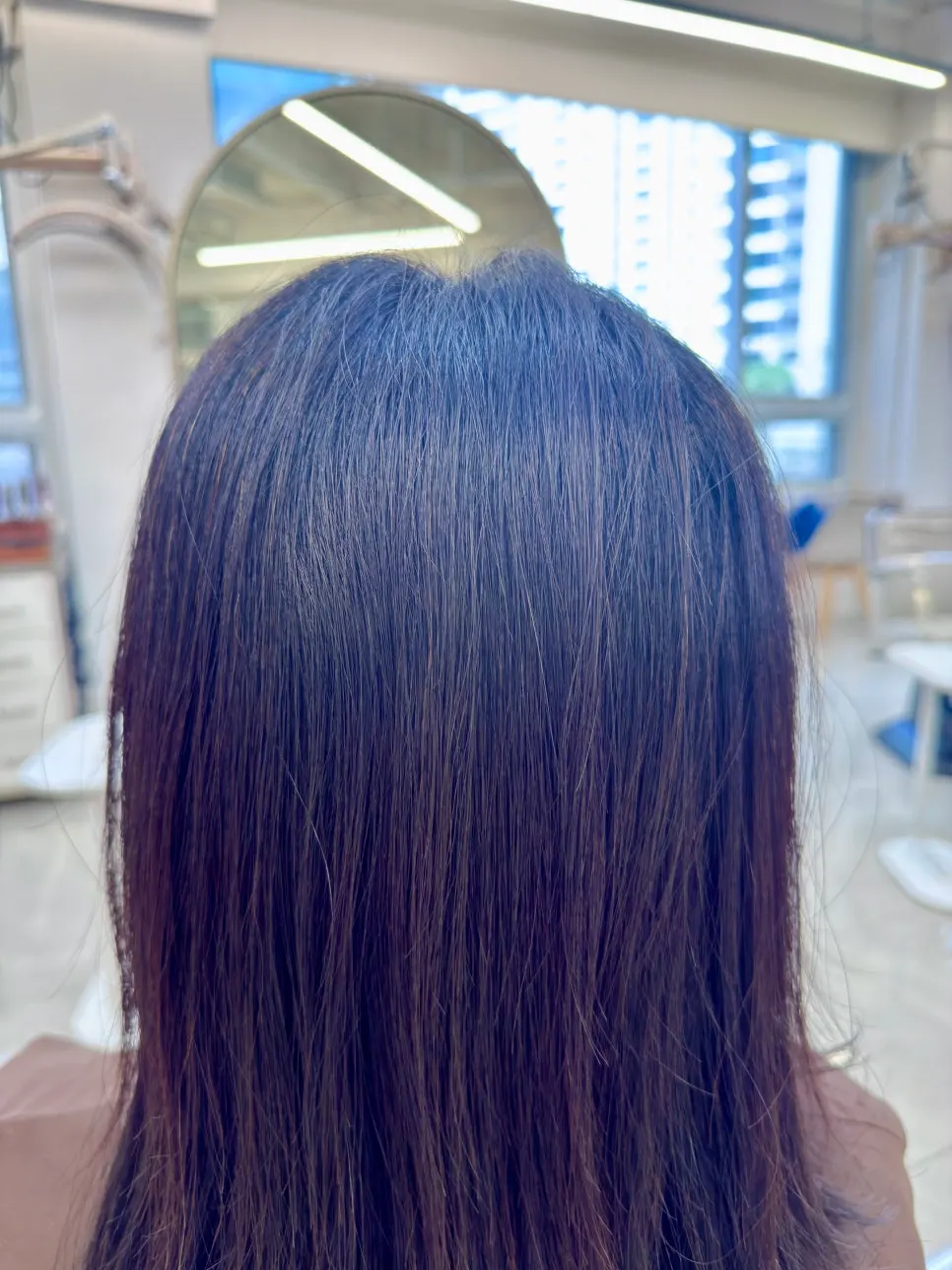 Wavy hair before root straightening
