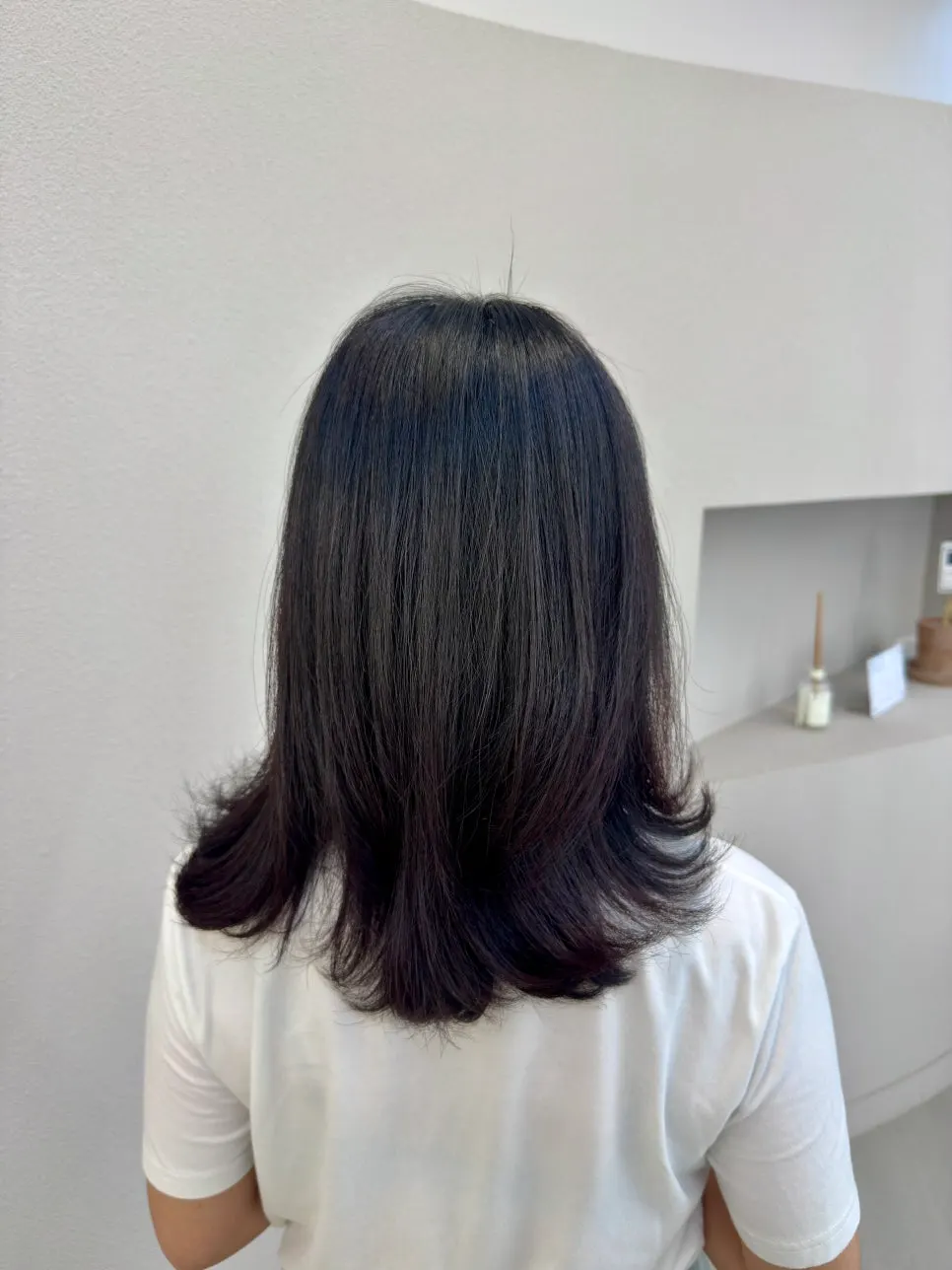 Back view after root straightening and a cut
