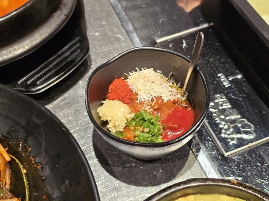 Kunefe sauce served alongside the meat