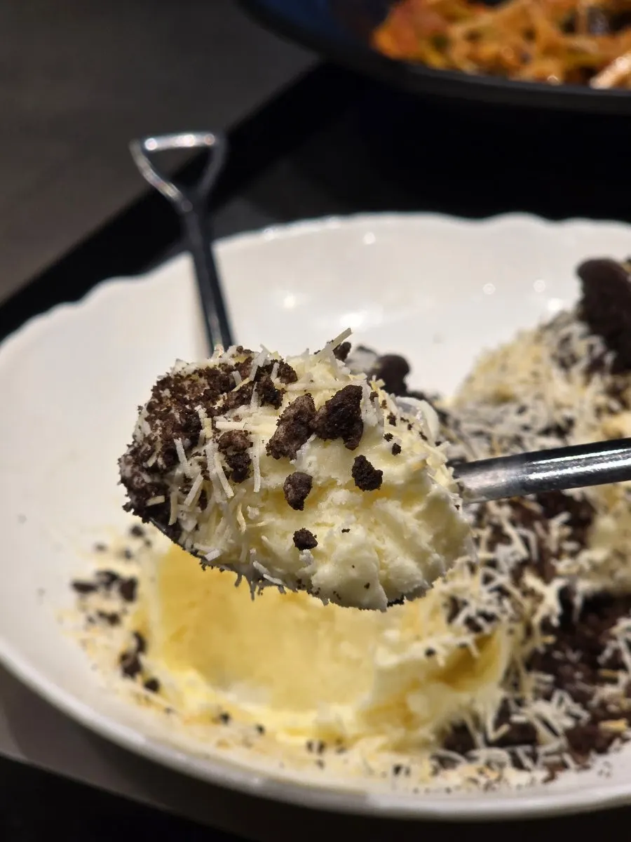 Free dessert served with a shovel-shaped spoon