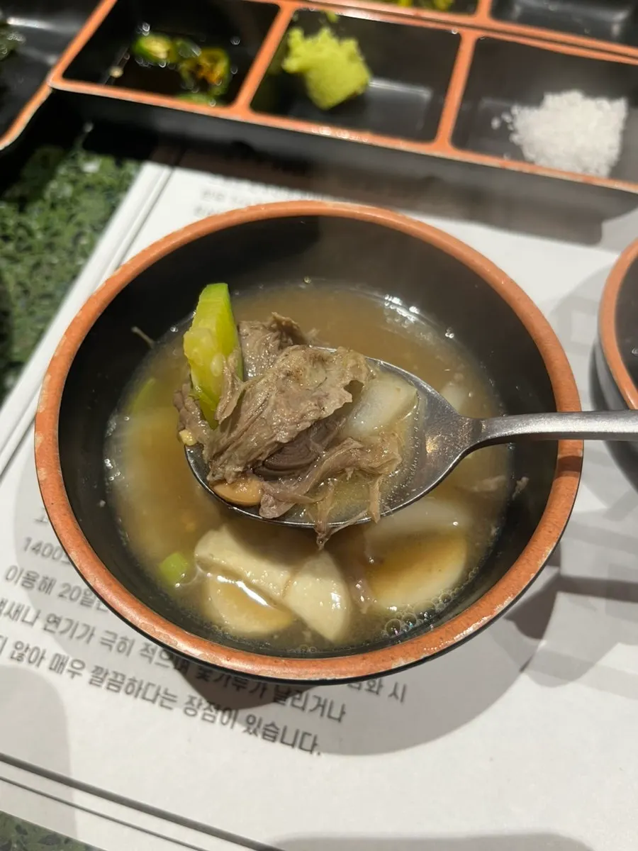 Soft hanwoo pieces inside the doenjang jjigae