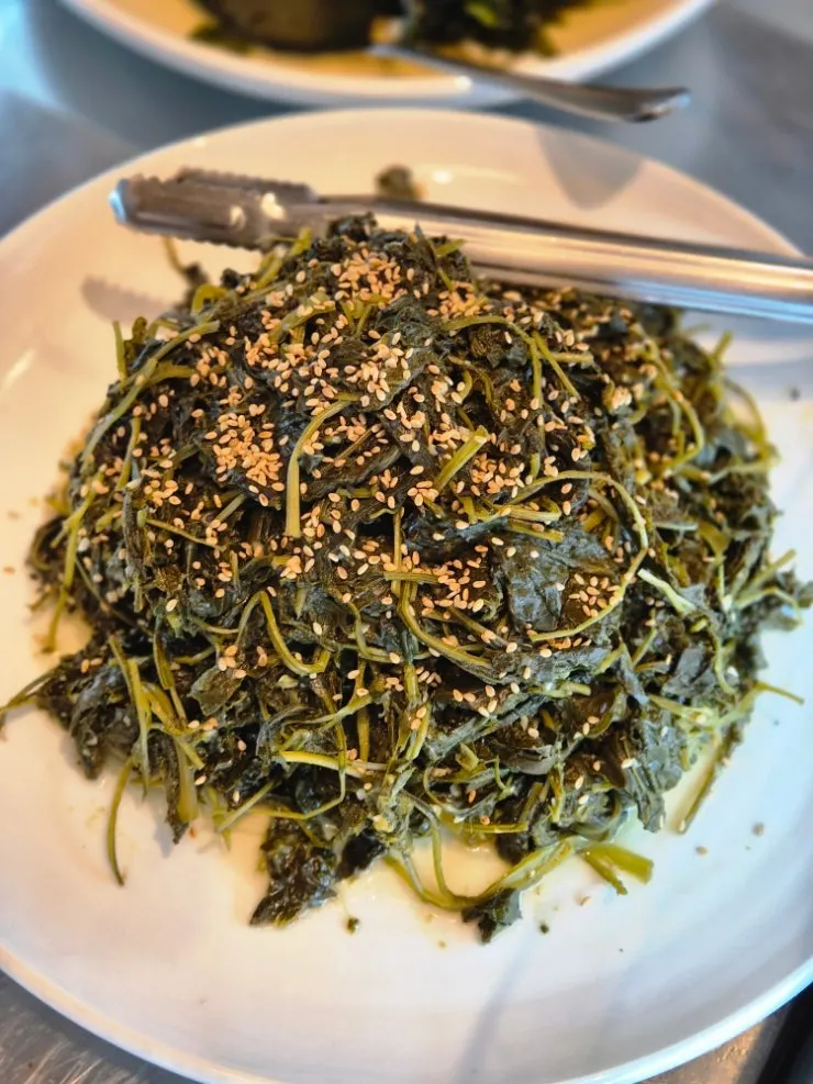 Namul and fried eggplant served as basic side dishes
