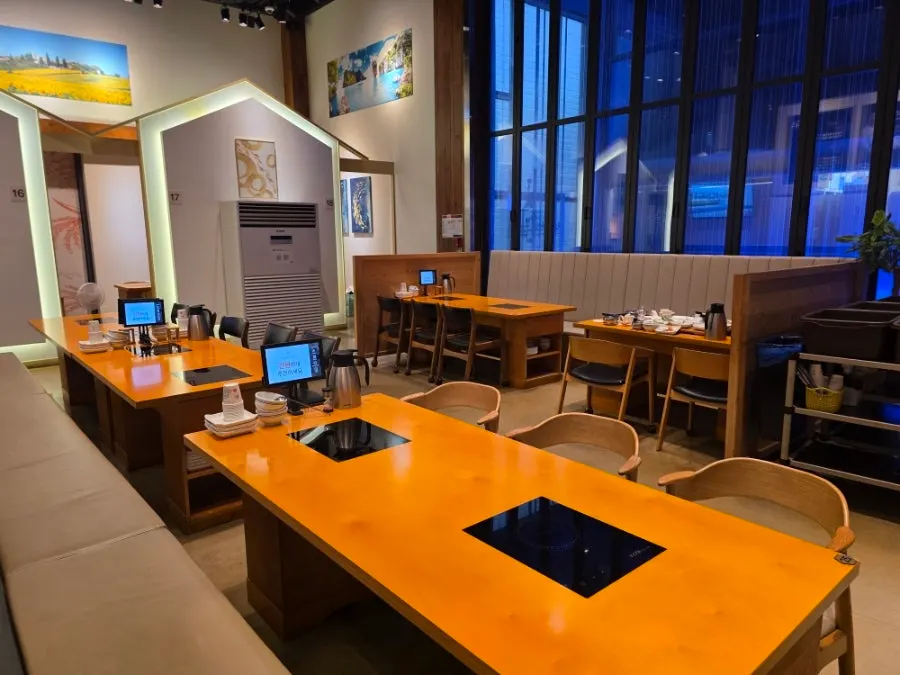 Interior view of generously spaced tables