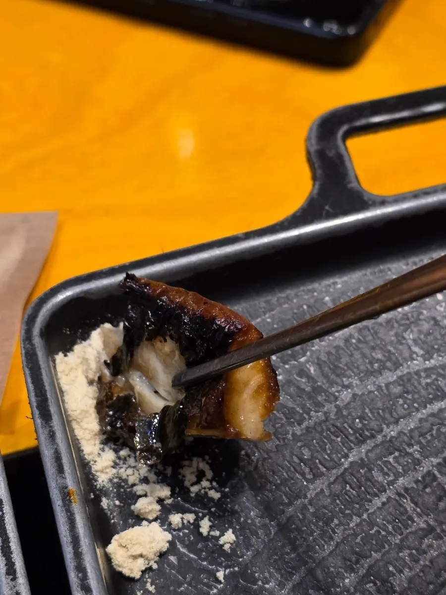 Wood-fired grilled mackerel with scored skin and nuruk salt