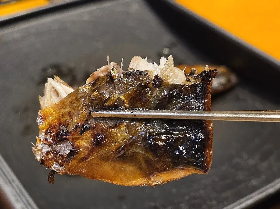 A piece of mackerel dipped in nuruk salt